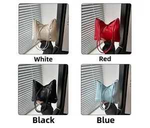 Detailansicht der eleganten Leder-Einkaufstasche mit Schleifenzug in vier Farben