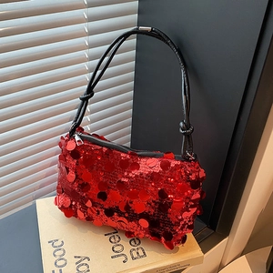 Chic red sequin shoulder bag with black leather handle and stylish knot detail