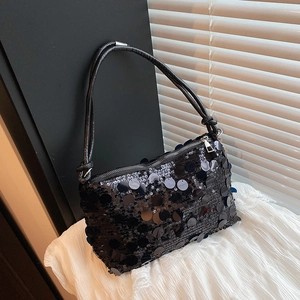 Fashionable black sequin shoulder bag for women with leather handle and silver metal zipper