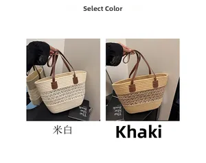 Detail of woven straw tote bags in khaki and off-white with faux leather handles