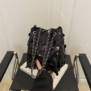 Fashionable black sequin bucket bag with silver chain strap for evening parties