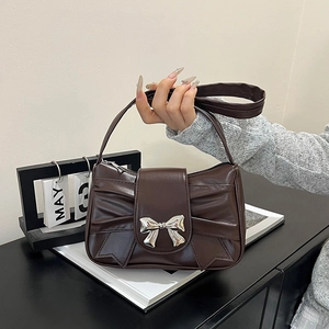 Dark brown PU leather underarm bag with pleated design and silver bow accent