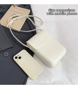 Detailed size comparison of the cream PU leather phone bag with a large smartphone