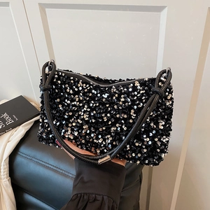 Sparkly sequin shoulder bag for women with black and silver sequins and thin leather strap
