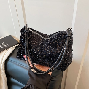 Chic black sequin crescent shoulder bag with rope straps and silver hardware detail