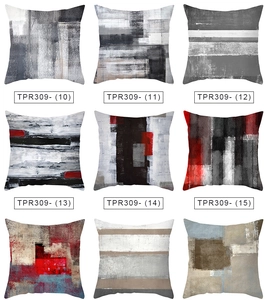 Detailansicht quadratischer Kissenbezüge mit abstrakten Aquarelldrucken und sauberen Nähten