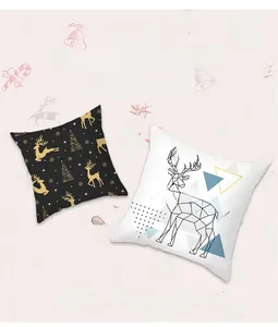Detail of Christmas pillowcase in peach skin fabric with golden reindeer patterns