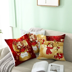 Three-piece set of Nordic Christmas pillow covers with Santa and Snowman on a gray sofa