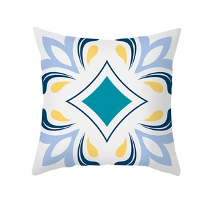 Housse de coussin moderne en peau de pêche aux motifs géométriques bleu et jaune