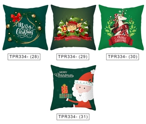 Dettaglio di quattro federe natalizie verdi con motivi di Babbo Natale ed elfi