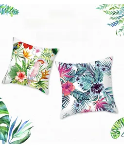 Detail of tropical peach skin pillowcase with vibrant flamingo and palm leaf prints