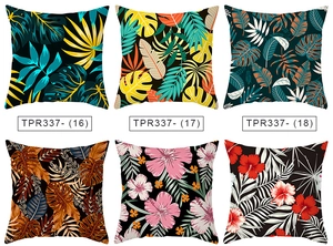 Detailed grid of peach skin cushion covers featuring green tropical leaf and flower patterns