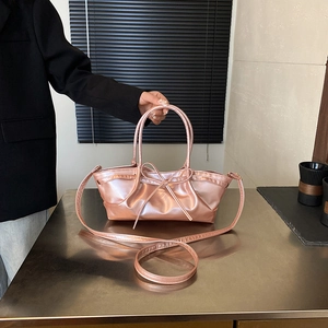 Sac à main rose doré métallisé avec nœud et bandoulière réglable pour femmes