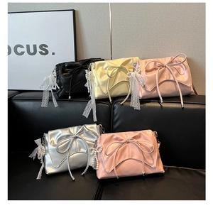Sacs portés épaule avec nœud papillon en noir, jaune, rose, argent et orange