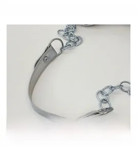 Close-up of silver chain strap and synthetic leather handle with stitching detail