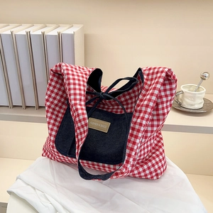 Red plaid tote bag with denim pockets and fashion leather label for women's casual style
