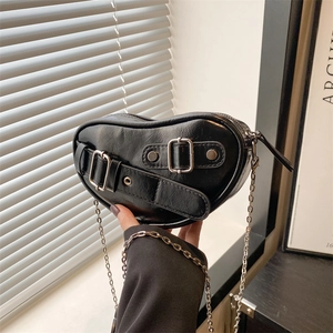 Minimalist heart-shaped black leather shoulder bag with chic silver chain and buckle detail