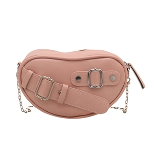 Pink heart-shaped underarm bag with silver chain strap and decorative buckles for women
