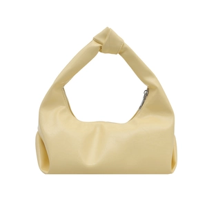 Minimalist cream yellow croissant bag with soft pleated texture and single knot handle