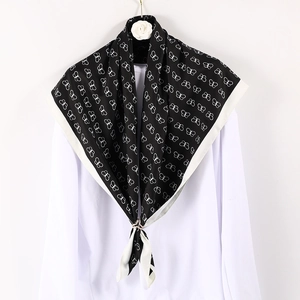 Elegant 90cm square silk scarf featuring a white butterfly print on a black background