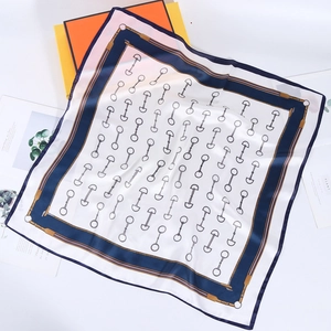 70cm square silk scarf featuring blue borders, horse-bit patterns and golden details