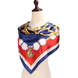 90cm chain print satin scarf featuring red, blue, and cream color block design on mannequin
