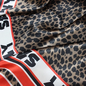 Leopard print silk scarf with stylish red and white border and bold letter prints