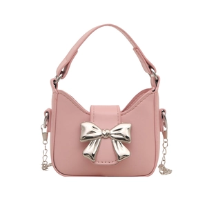 Pink girls mini handbag with silver bow accent and crossbody chain strap