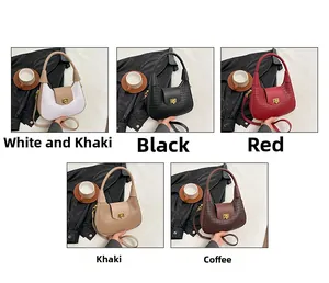 Close-up of crescent woven bags in five colors: white-khaki, black, red, khaki, and brown