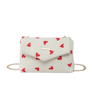 Chic corduroy crossbody bag with red heart pattern and elegant gold chain strap