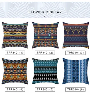 Detailansicht von sechs Kissenbezügen mit geometrischen Boho-Mustern in Blau und Orange