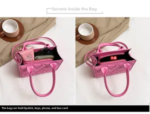 Top view detail of pink quilted PU leather handbag interior showing main compartment space