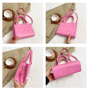 Pink quilted crossbody bag details with gold hardware and fashion branding