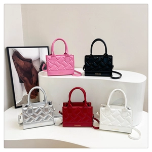 Detailed display of mini PU quilted crossbody bags in pink, black, silver, red, and white