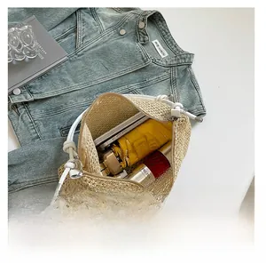 Top view of spacious straw tote bag showing internal storage for daily essentials