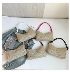 Detailed series of crescent straw woven tote bags with colorful leather knotted handles