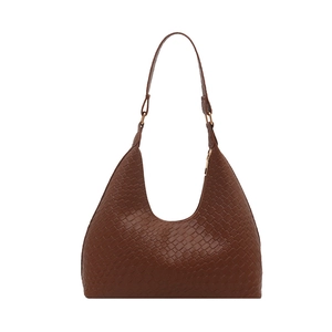 Chic brown woven hobo bag with moon-shaped design and minimalist single handle