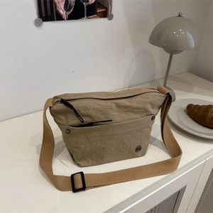 Fashionable khaki pleated puff shoulder bag with wide strap and multi-pocket design