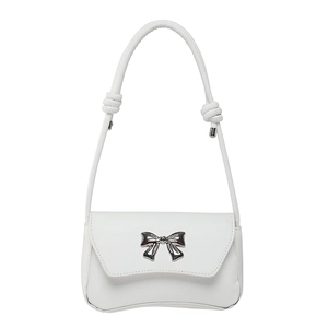 Minimalist white faux leather shoulder bag with silver metallic bow and knotted strap