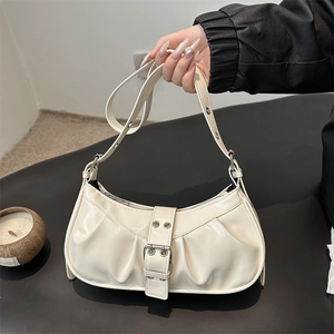 Chic cream white pleated crescent shoulder bag with metallic buckle details for women
