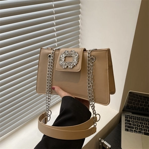 Beige rhinestone buckle shoulder bag with silver chain strap for elegant office style