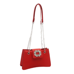 Red curved rhinestone handbag with silver chain strap on white background