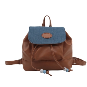Vintage brown leather and blue denim backpack with fashion patch for women