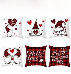 Detail view of six Valentine pillow covers with red buffalo plaid and gnome prints