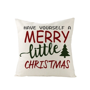 Gros plan d'une taie d'oreiller de Noël en lin avec imprimé sapin et citation festive