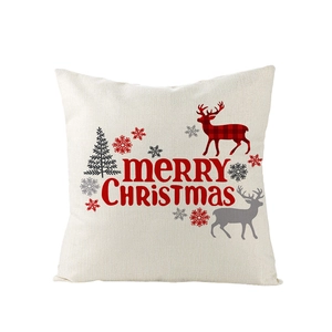 Détail de housse de coussin de Noël en lin avec cerf à carreaux et lettrage festif rouge