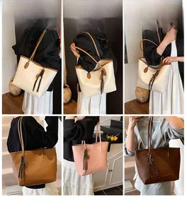Detail shots of large vintage tote bags in various colors with decorative silk scarves
