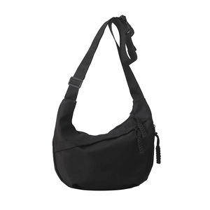 Minimalist black half-moon crossbody bag with adjustable strap and double zippers