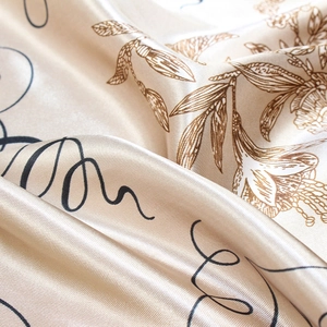 90cm satin silk scarf with brown floral musical note prints in elegant champagne gold
