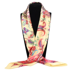 Satin square scarf with retro paisley and rose floral patterns on yellow silk fabric